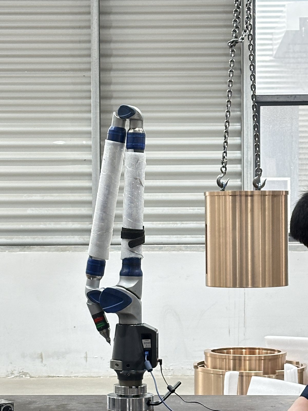 Portable dimensional measuring arm